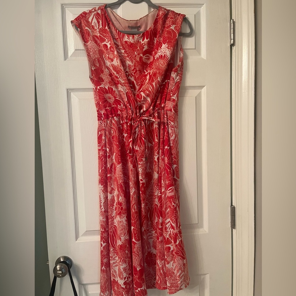 Cute dress with string to cinch waste.